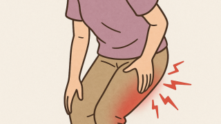 脚が痺れている女性