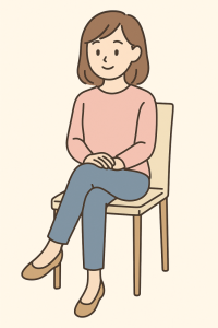 脚を組んでいる女性